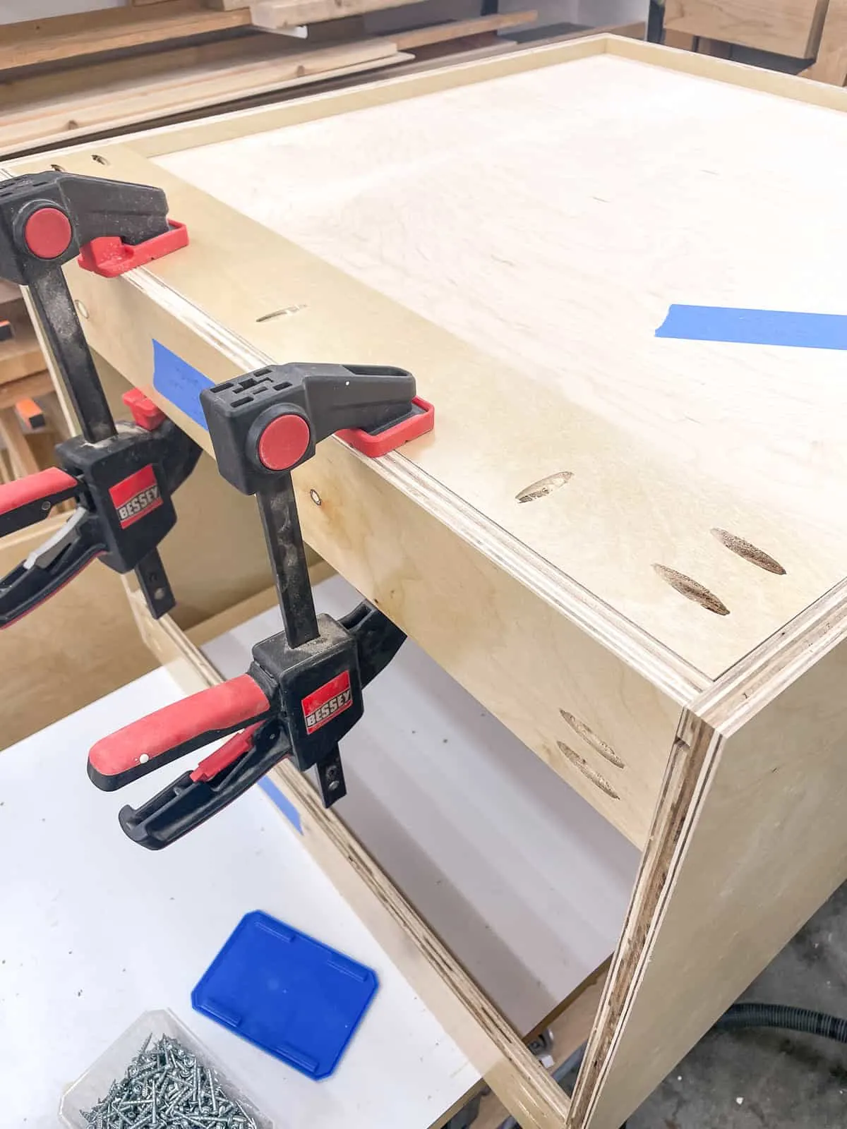 top nailer strip clamped to the back of the cabinet box