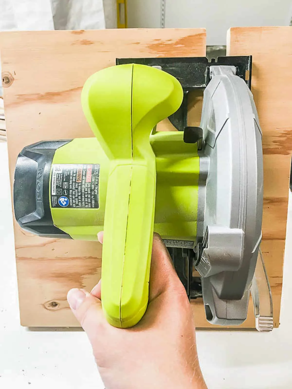 testing fit of the slot on the circular saw storage rack with the circular saw