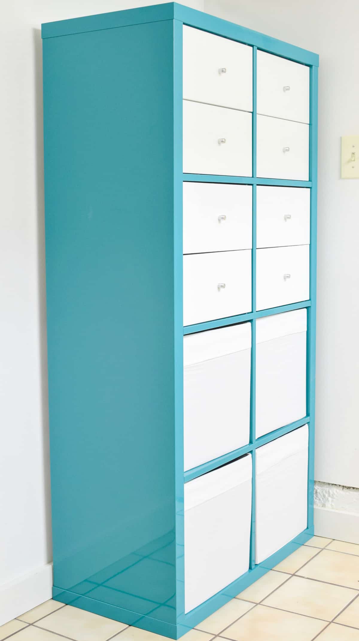 blue IKEA Kallax with drawers and bins