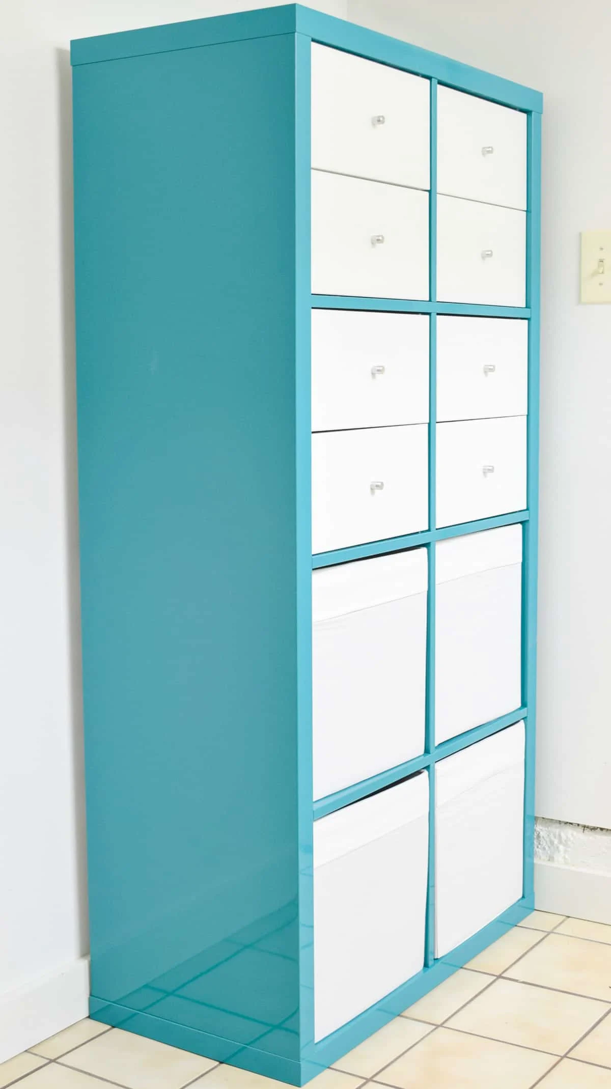 blue IKEA Kallax with drawers and bins