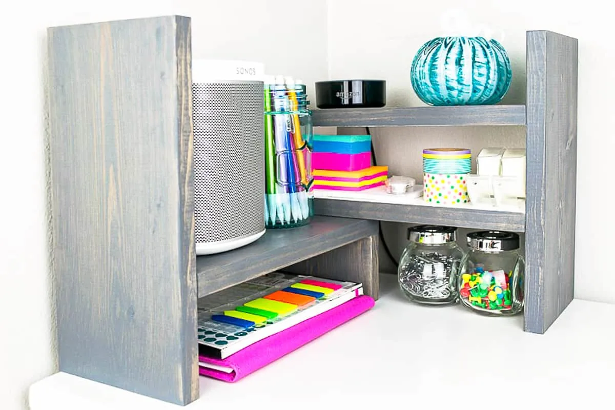 DIY desk shelf with school supplies in corner configuration