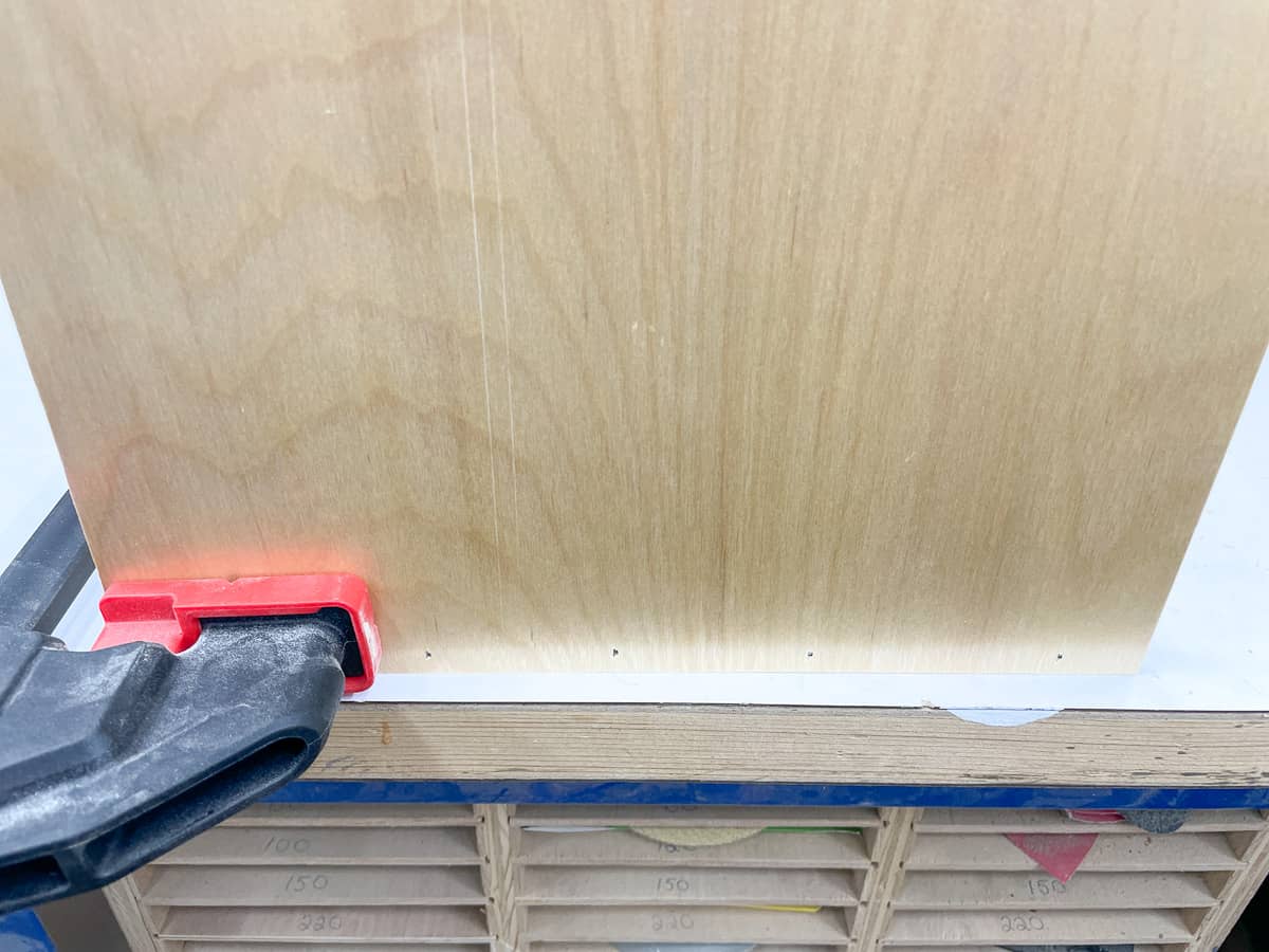 nailing sides of nail gun organizer to the bottom