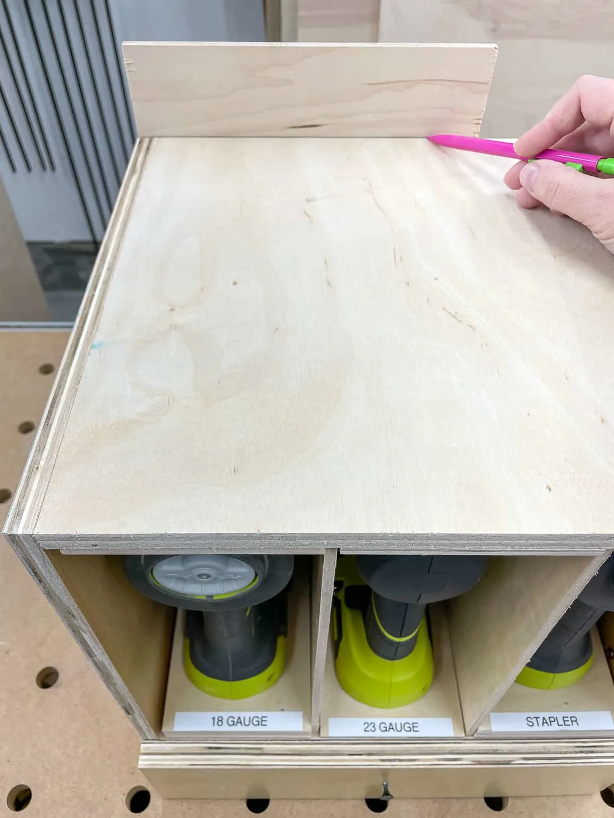 marking the height of the nail gun storage box for the backing