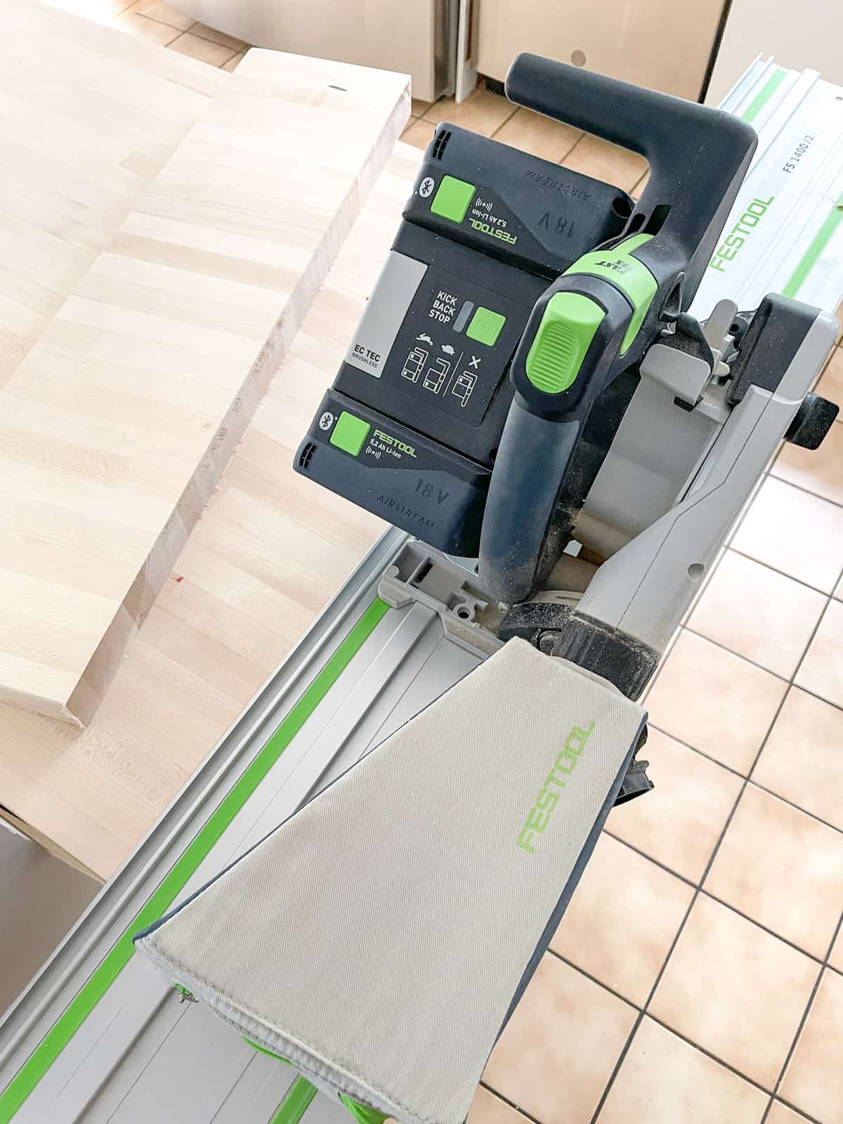cutting the end off a butcher block countertop with a track saw