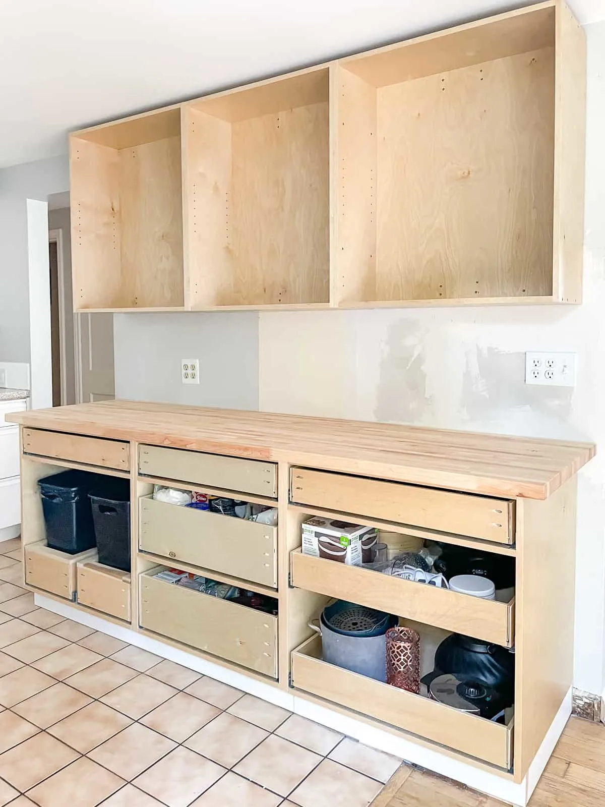 base cabinets with butcher block countertop installed
