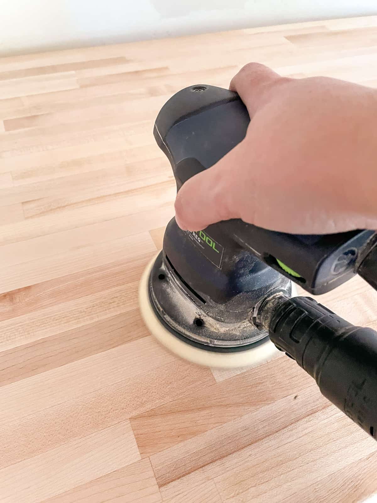 sanding a butcher block countertop