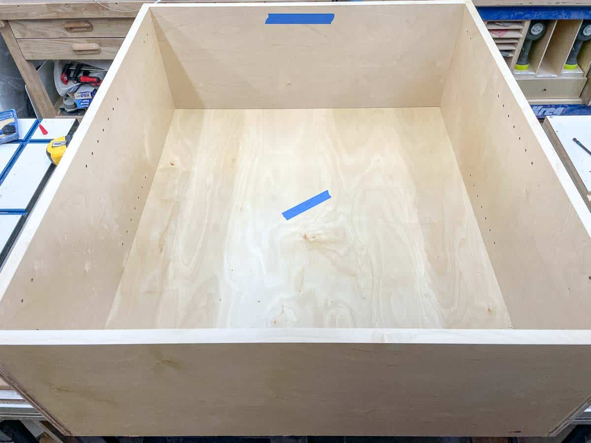 assembled wall cabinet on workbench