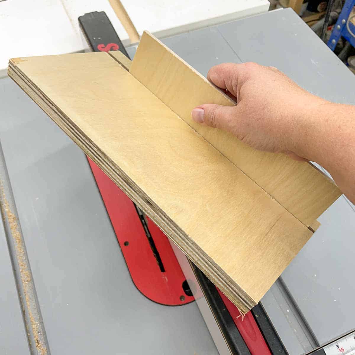 testing fit of the groove for the plywood back of a wall cabinet