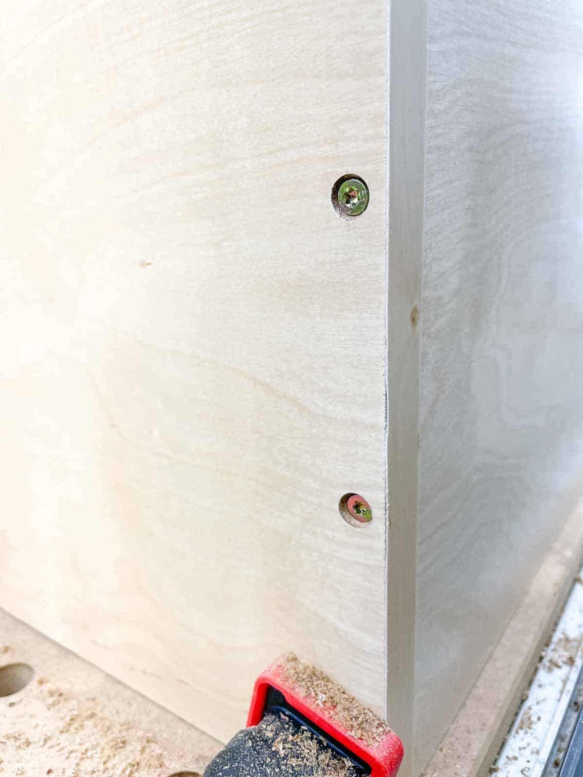 screws in side of DIY wall cabinet