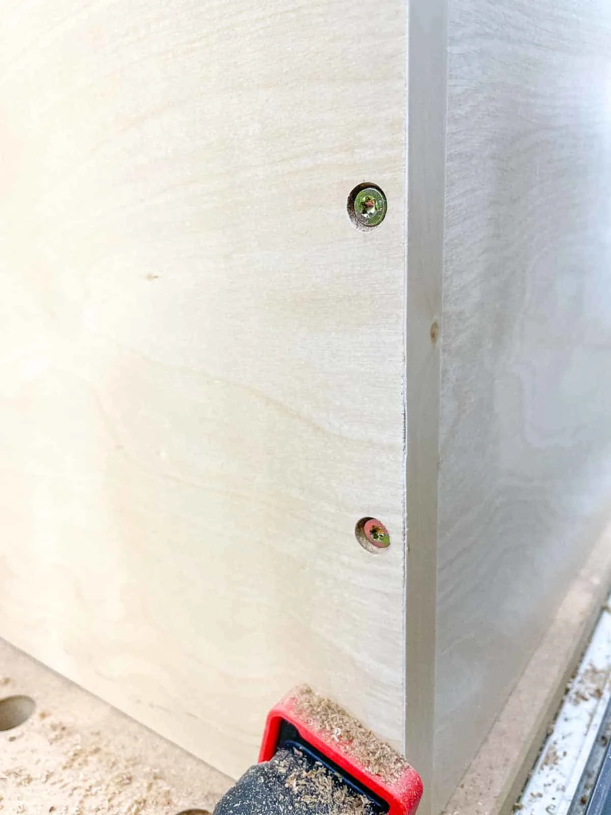 screws in side of DIY wall cabinet