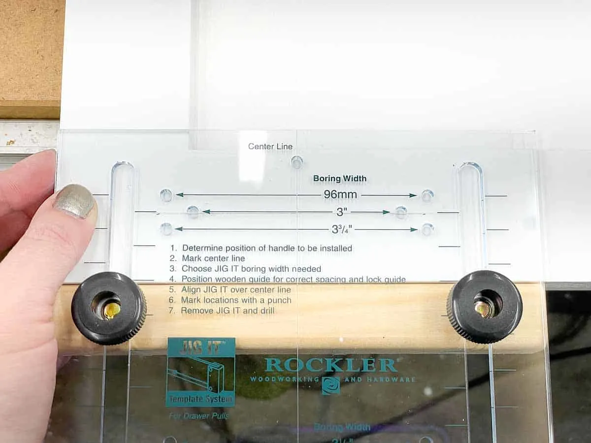 cabinet hardware jig for marking position of new handles on cabinet doors