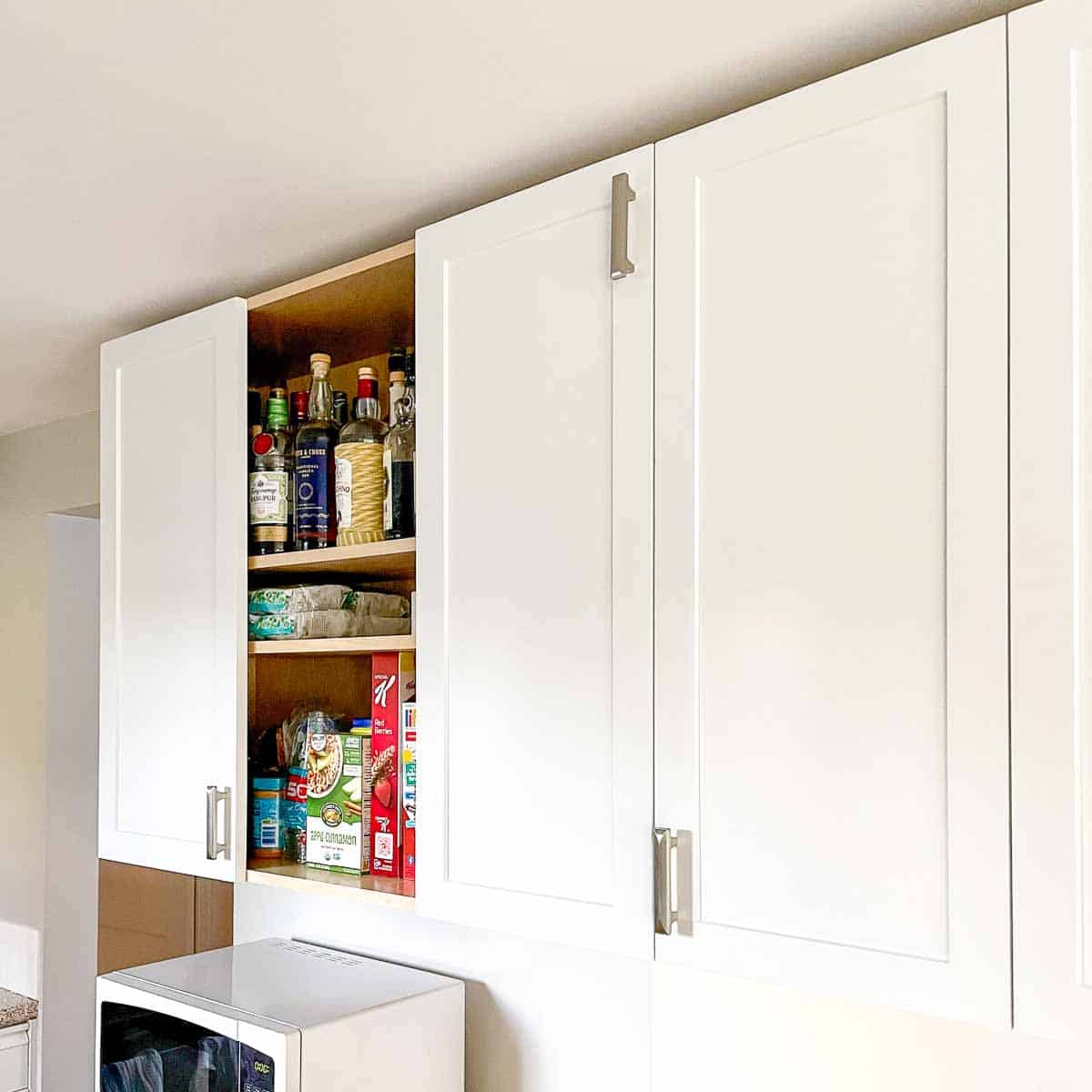 white shaker style cabinet doors with handle installed the wrong way