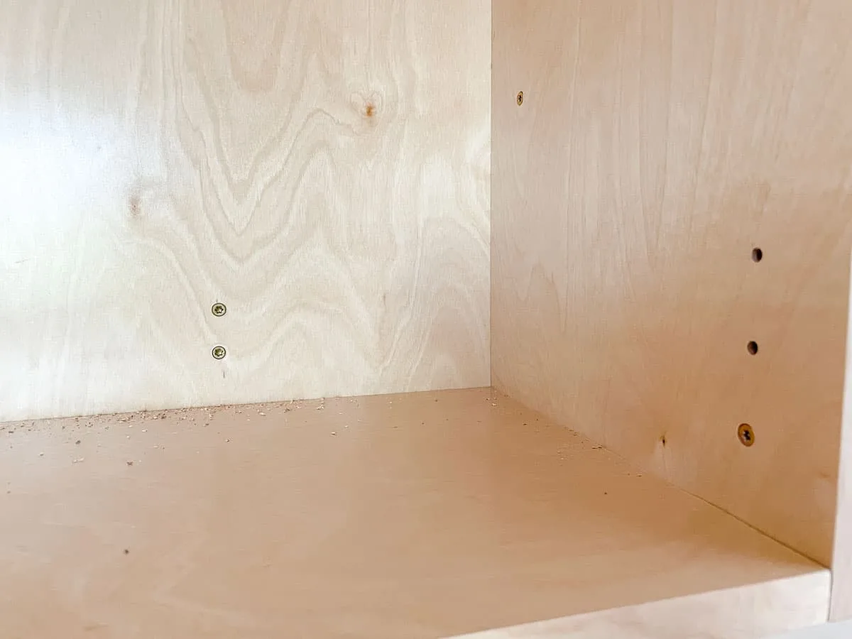 upper cabinets screwed together and to the studs in the wall