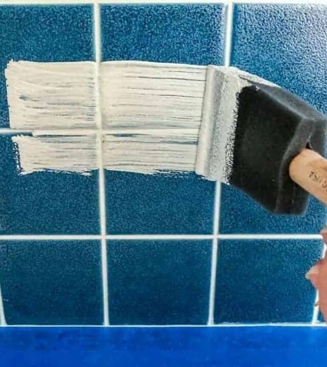 painting on primer with foam brush on blue tile