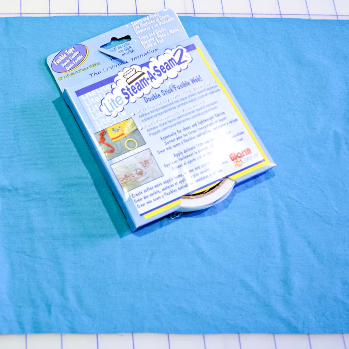 fabric for covering box with hem tape on top