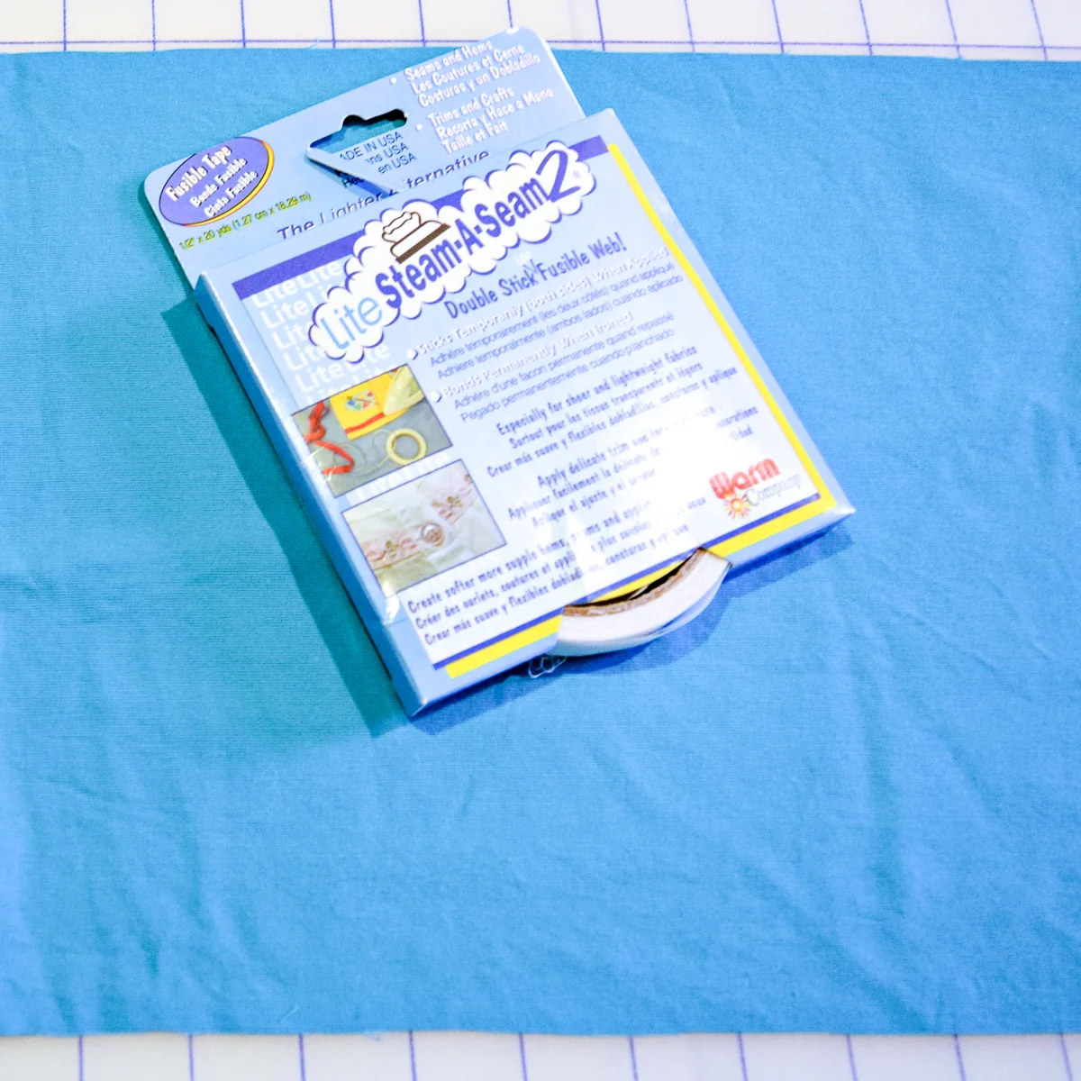fabric for covering box with hem tape on top