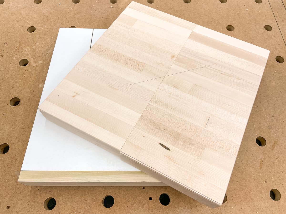 wood to be cut on pin in bandsaw circle cutting jig