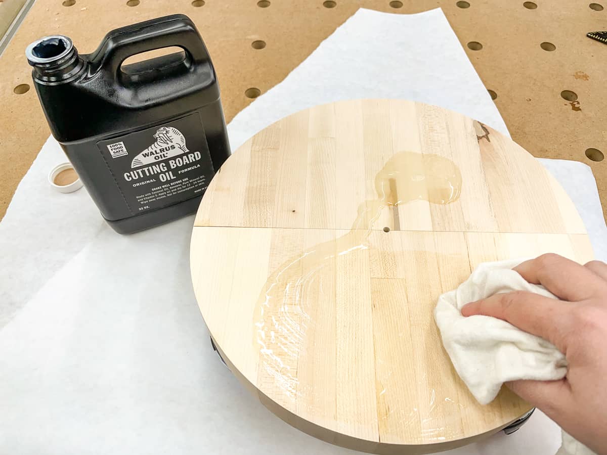 applying finish to the plant stand top