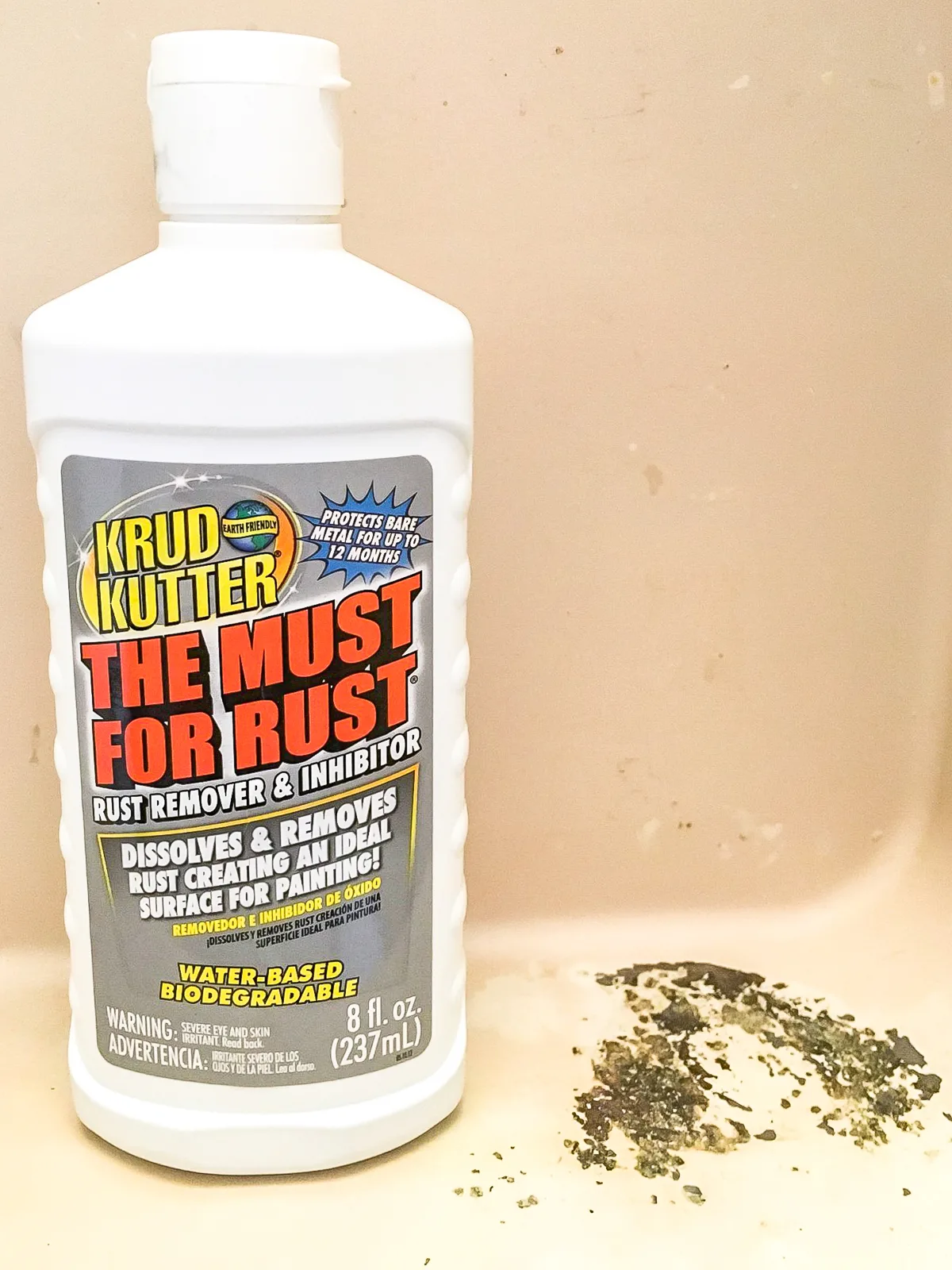 Krud Kutter rust remover and inhibitor on rusted metal surface