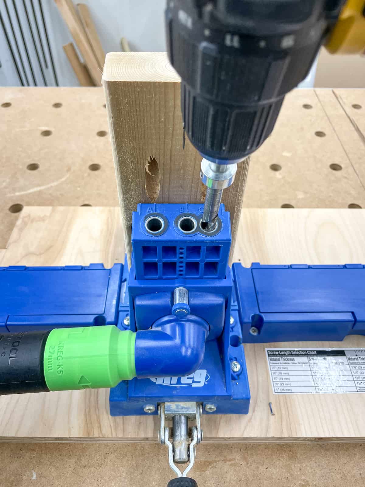 drilling pocket holes in both ends of the cedar 2x4 pieces