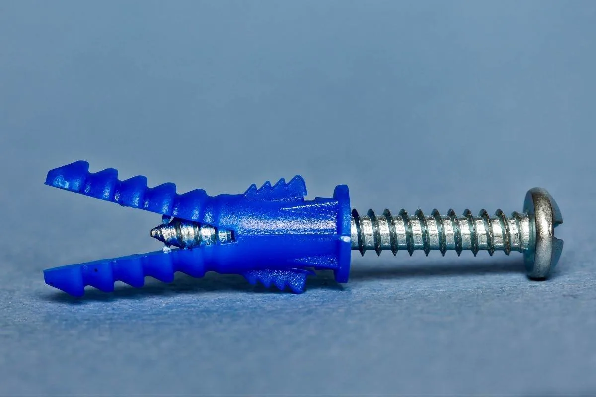 plastic drywall anchor expanded with a screw