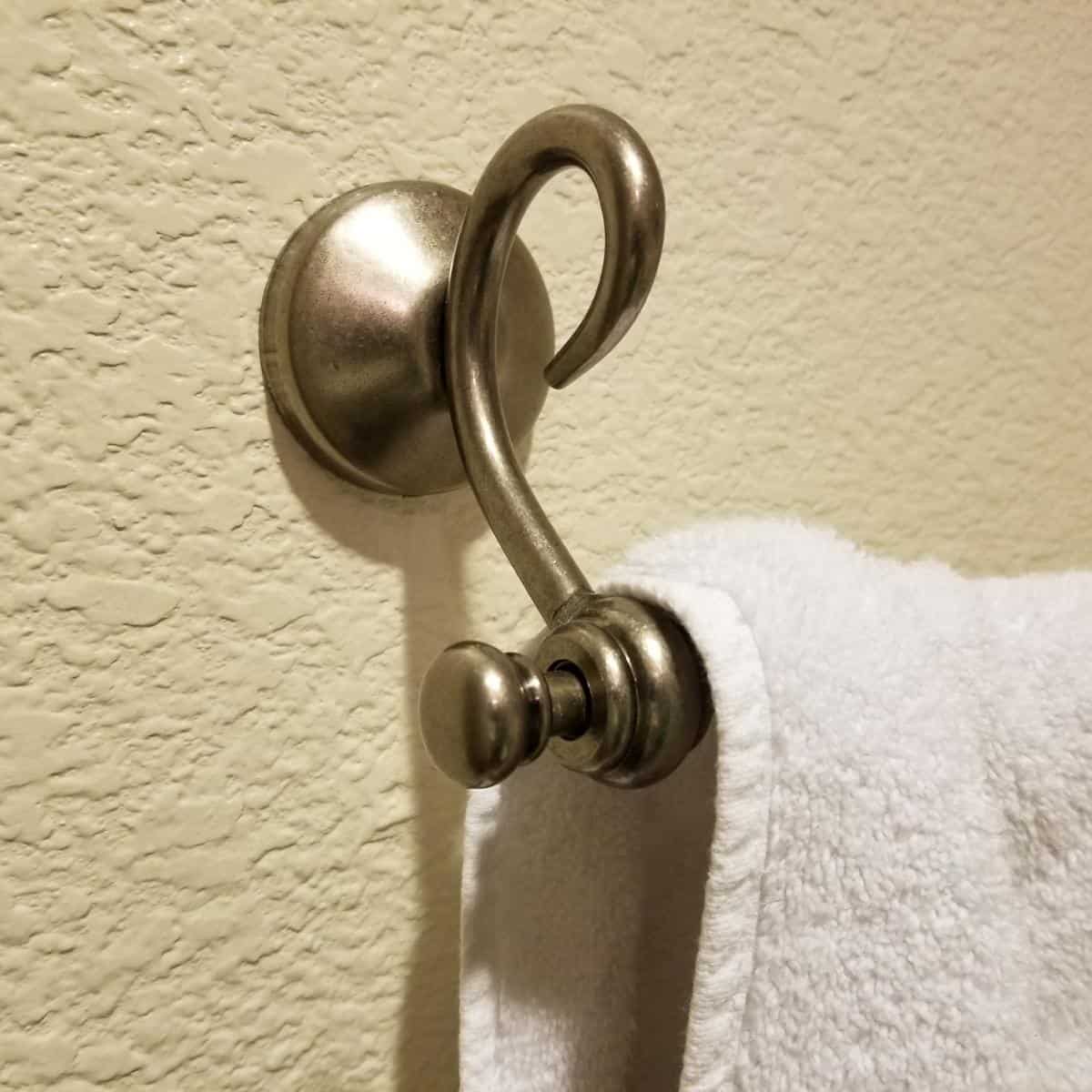 towel rack mounted on drywall