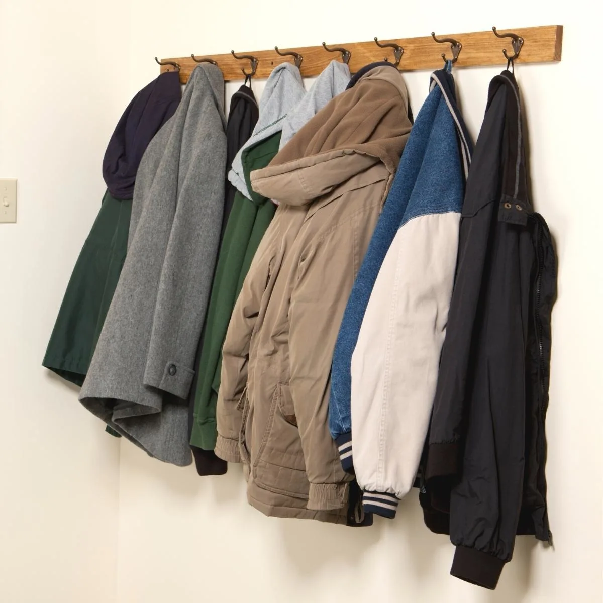 coat rack mounted to wall