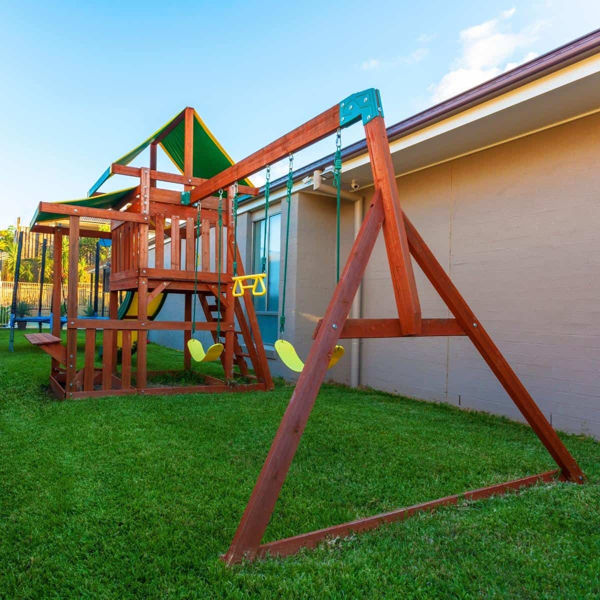 cedar play set in backyard