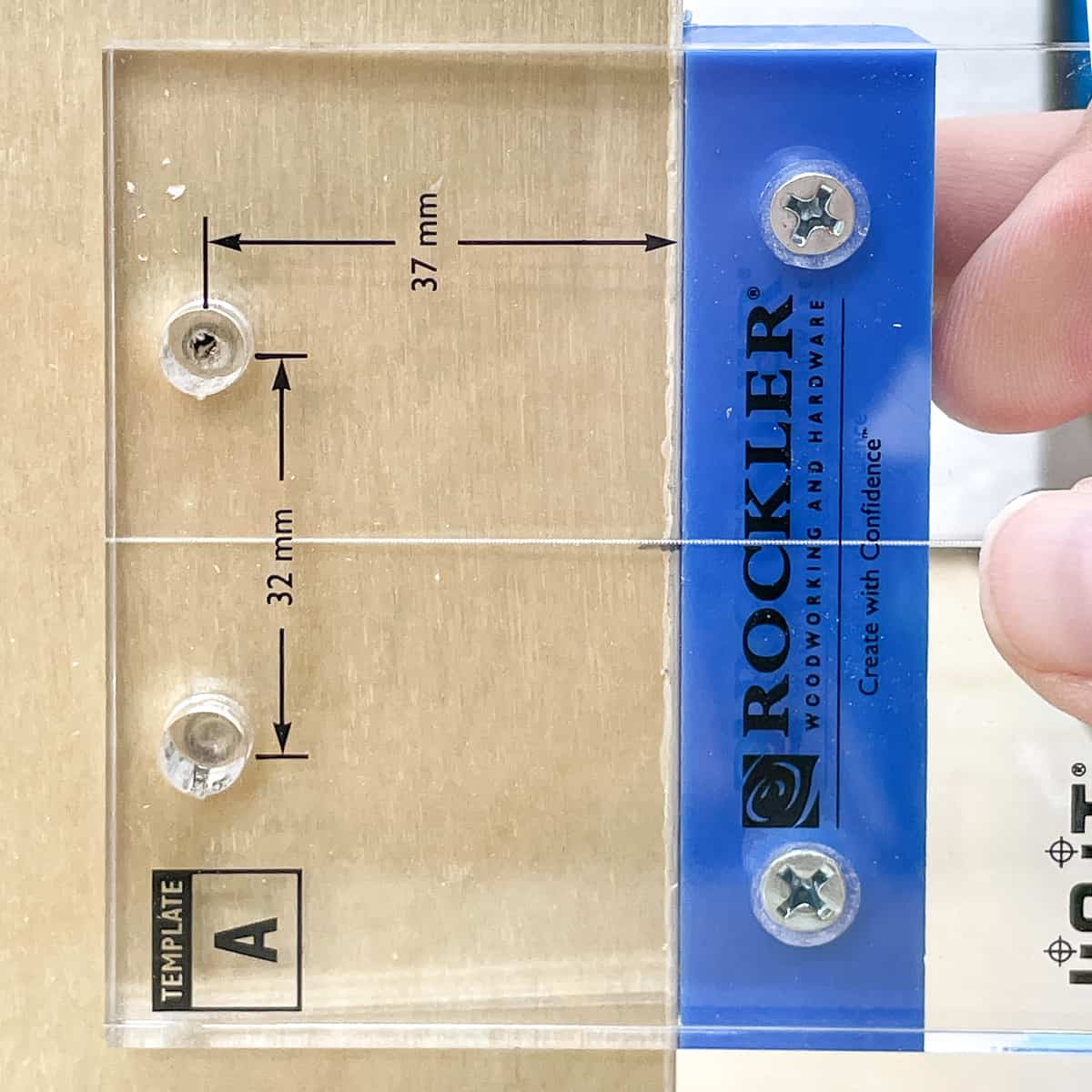 hinge mounting plate jig with holes for screws marked