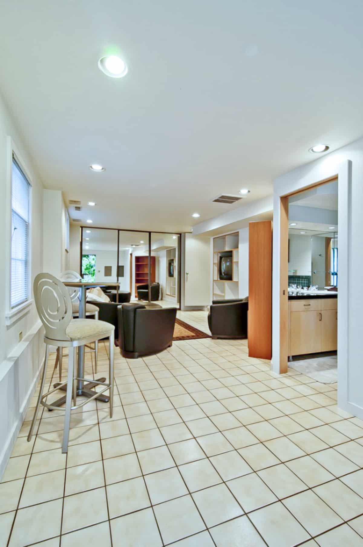 basement tile floor before carpeting