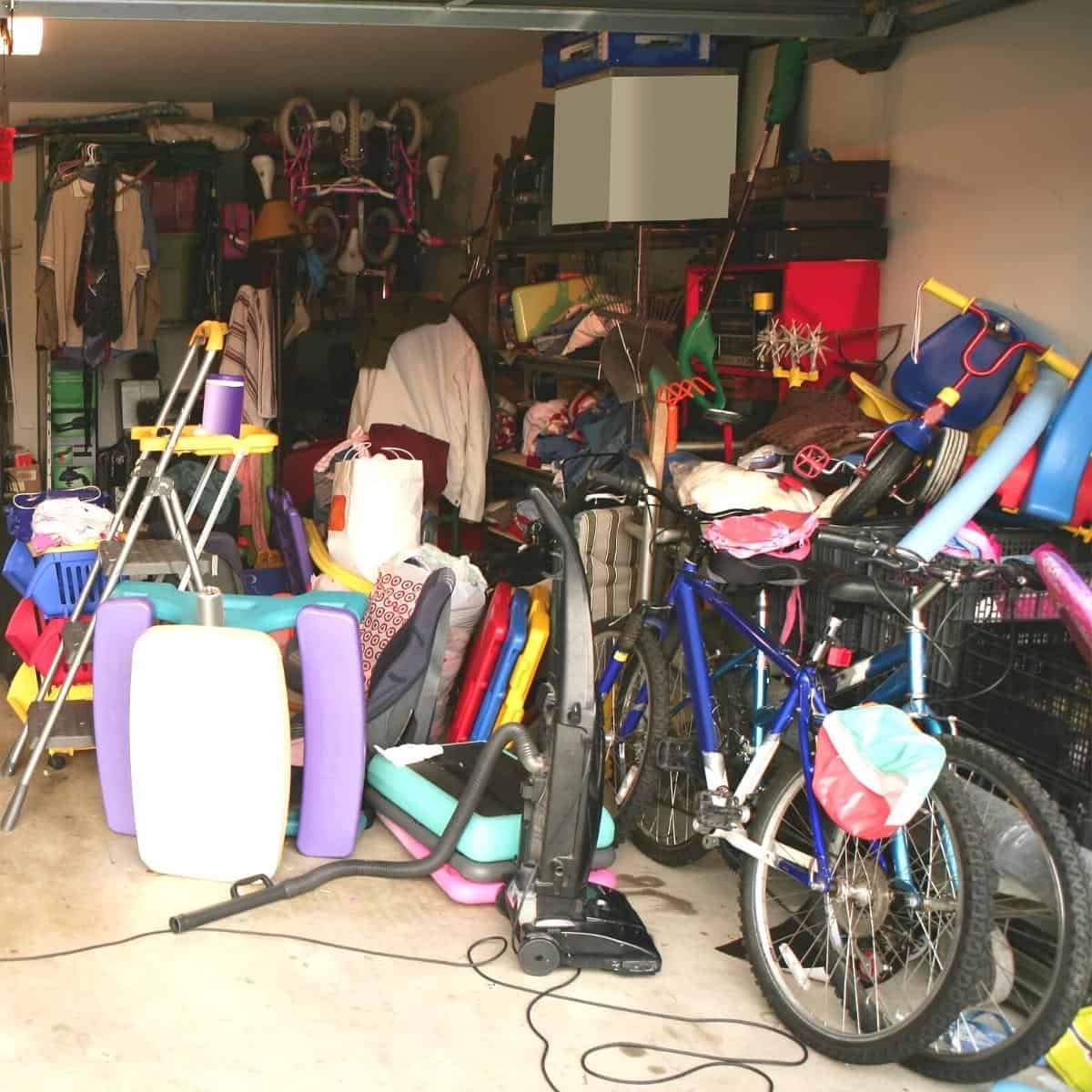 cluttered garage with bicycles