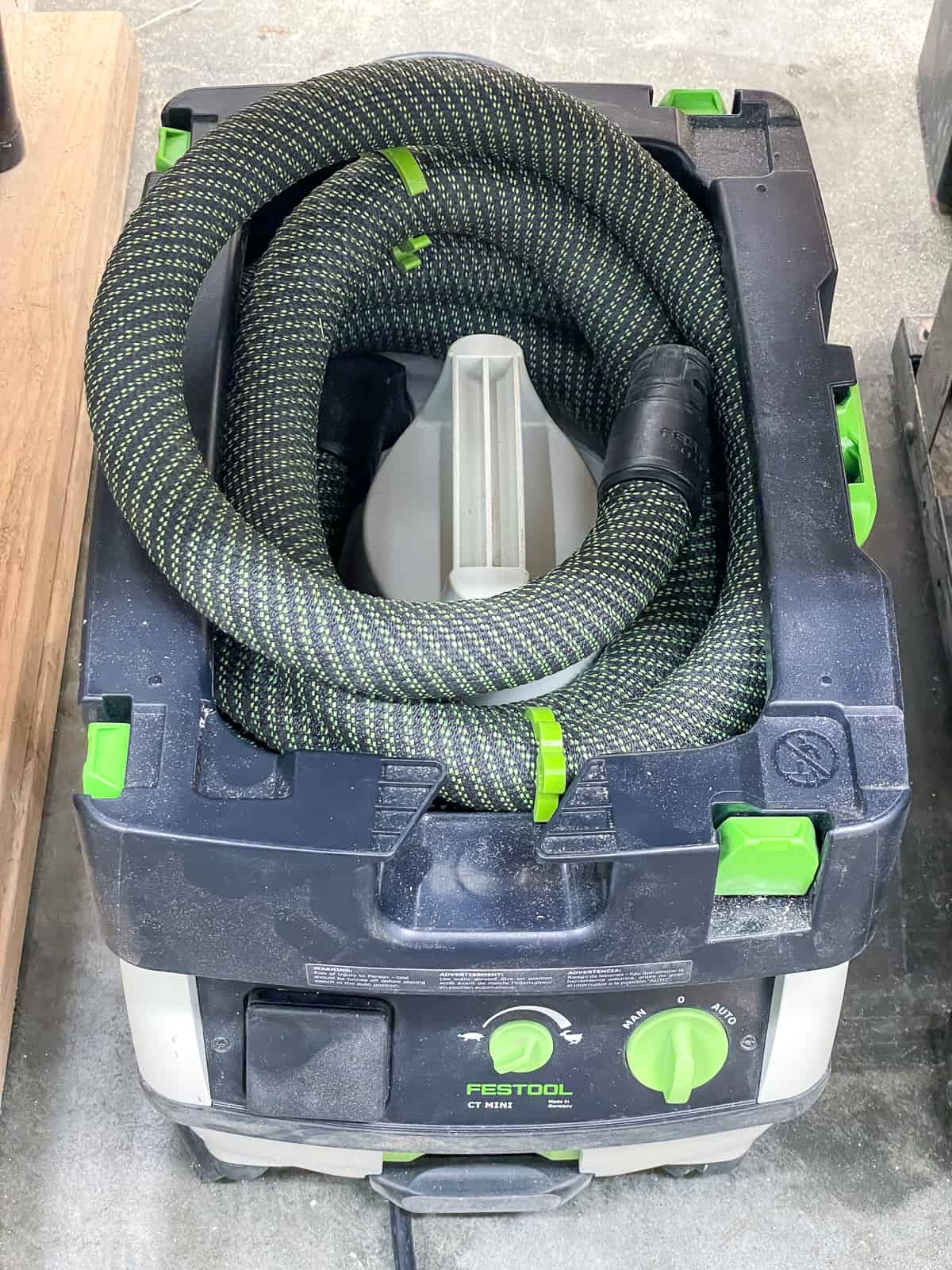 Festool dust extractor under workbench