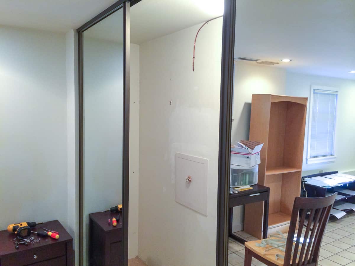closet with mirrored sliding doors