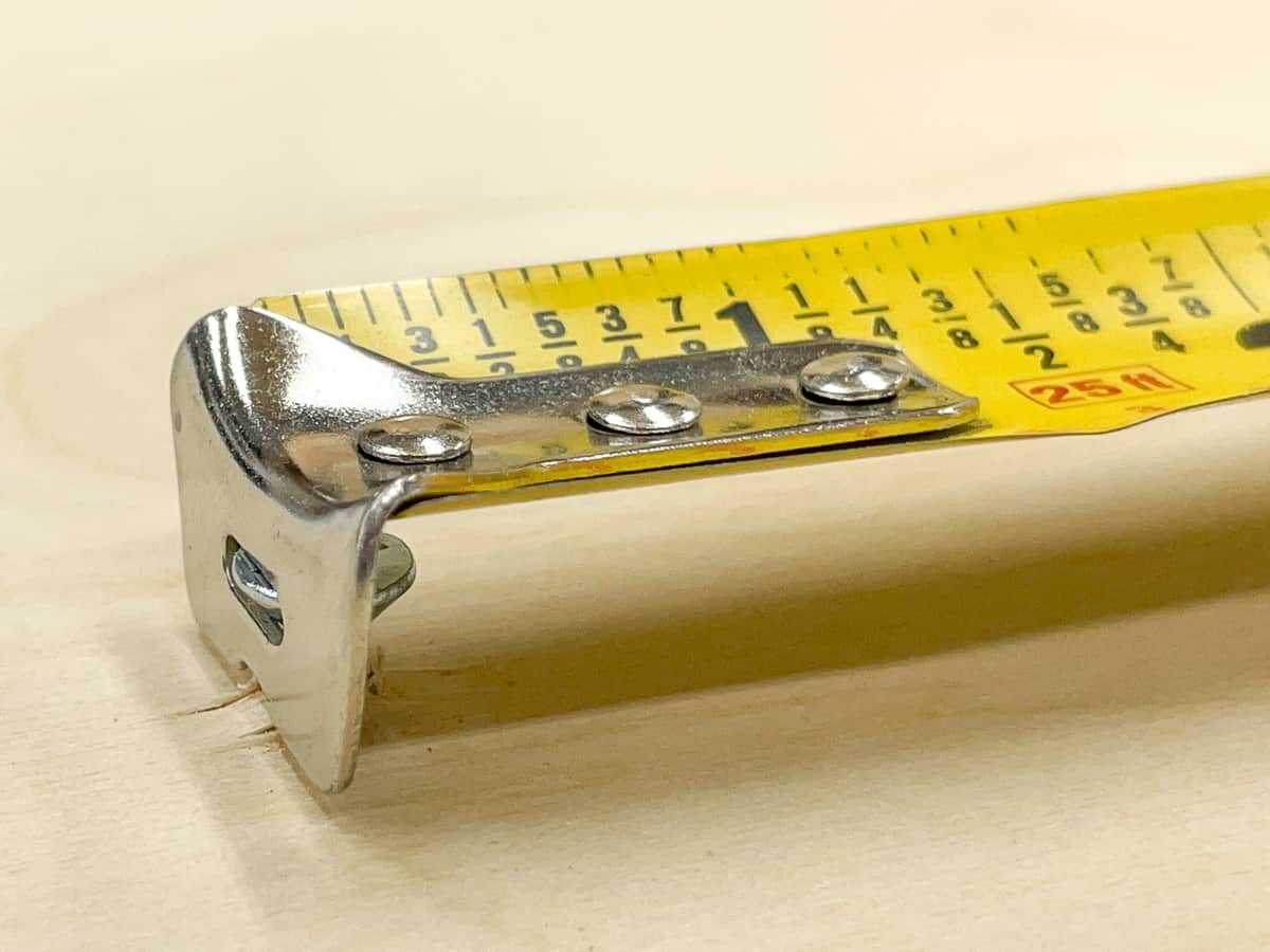 tape measure tab hooked on nail