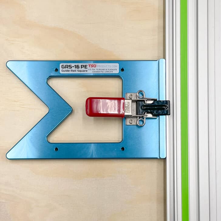 track saw square clamped on guide rail