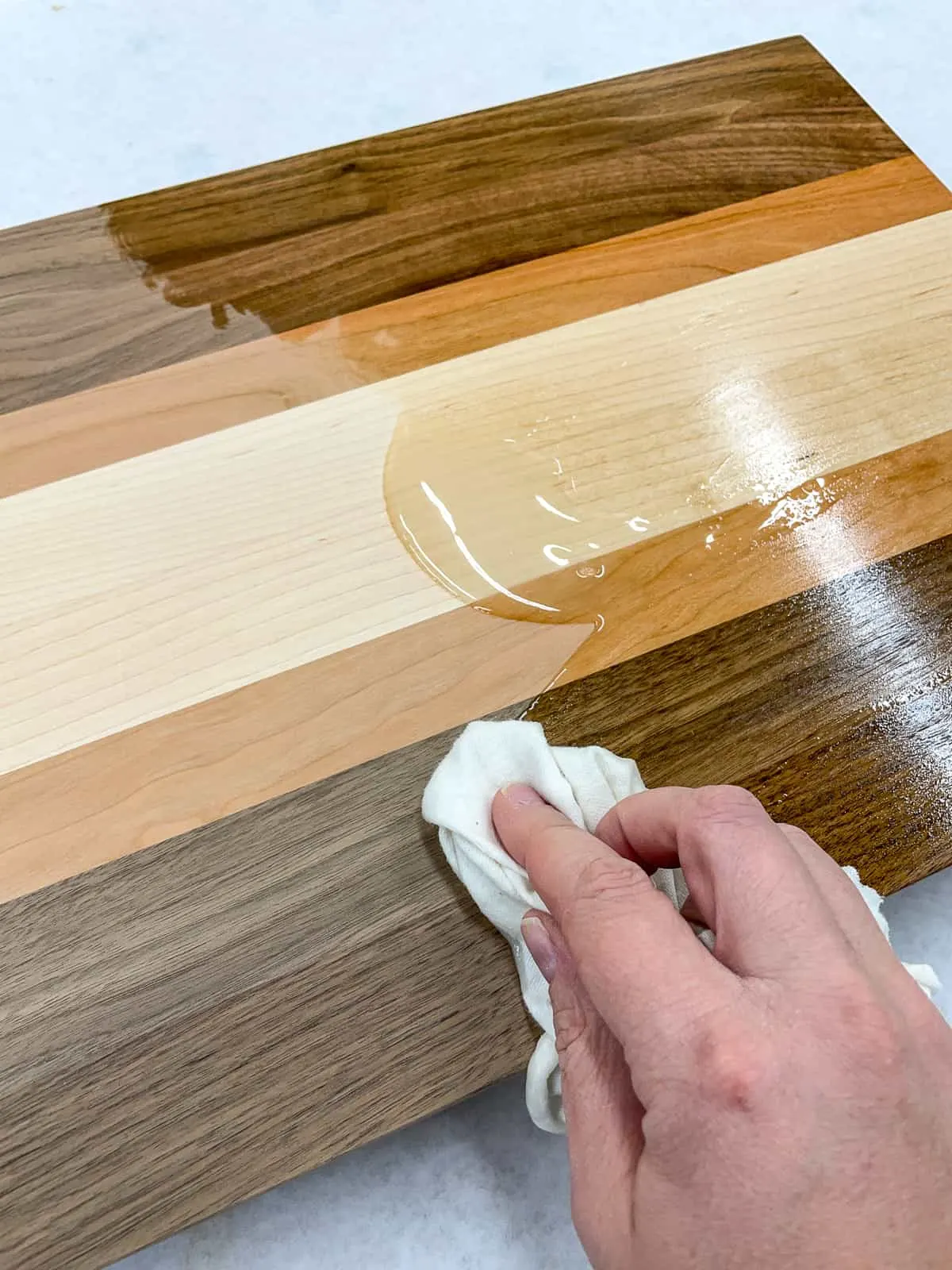 applying food safe oil to wooden cutting board