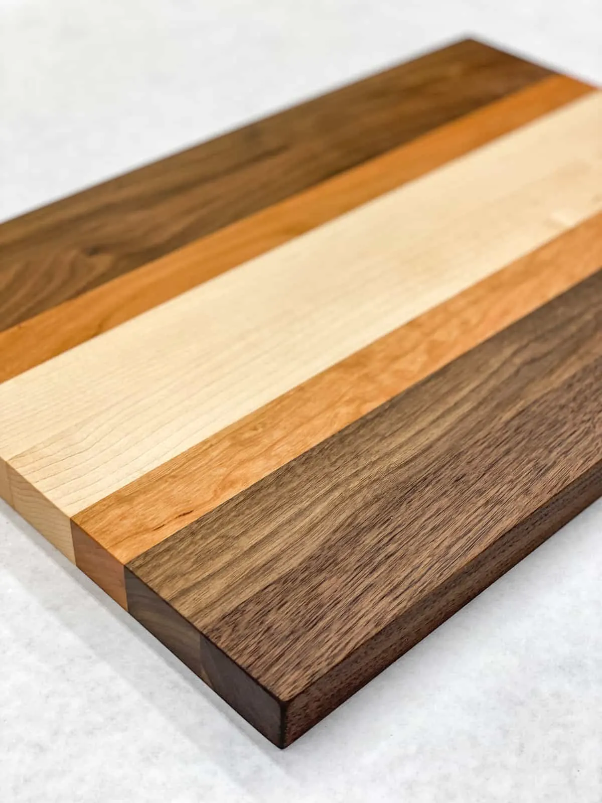 maple, cherry and walnut cutting board made from a kit