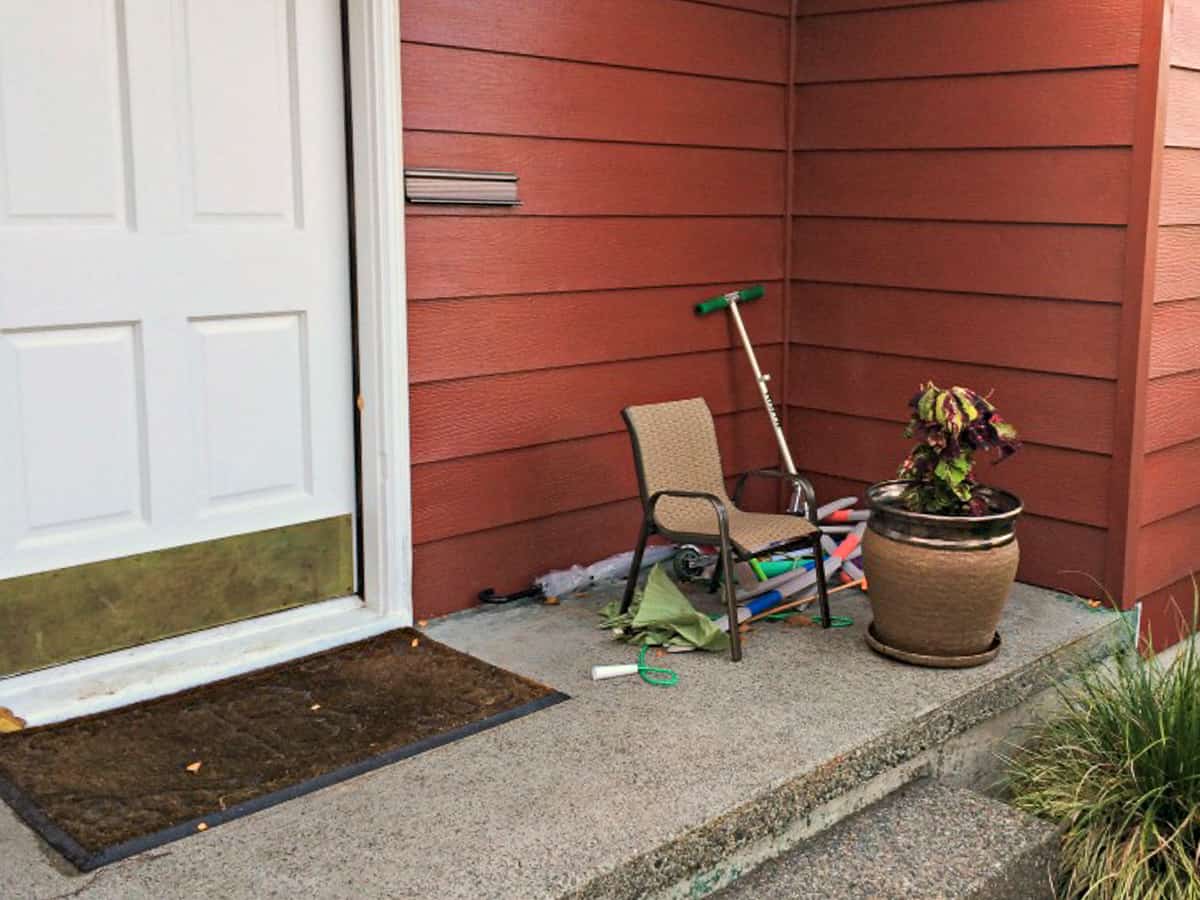 front porch cluttered with toys