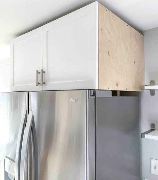 above fridge cabinet