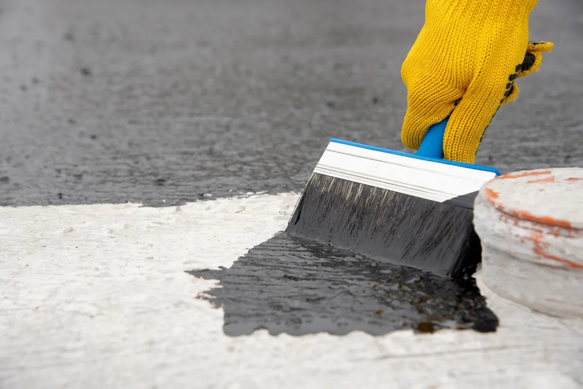 applying waterproofing sealant