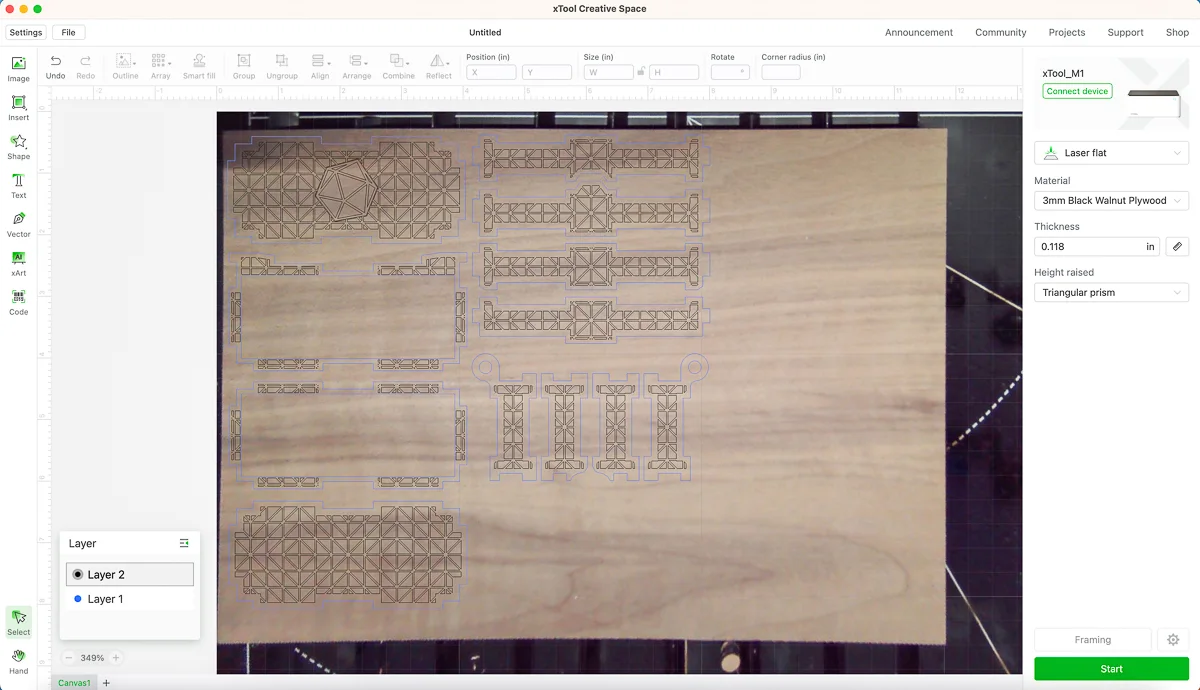 screenshot of xTool Creative Space software with parts for DIY dice box arranged on plywood