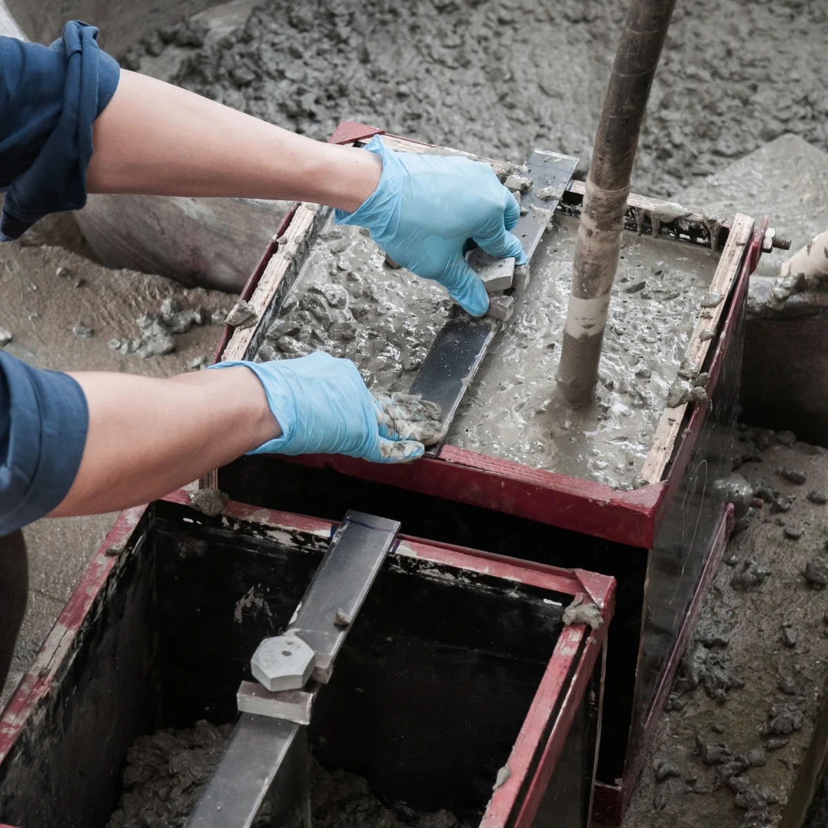 pouring concrete into a mold