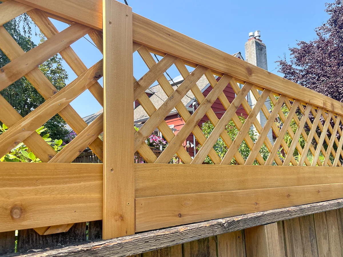 bottom trim on fence top trellis to cover up lattice