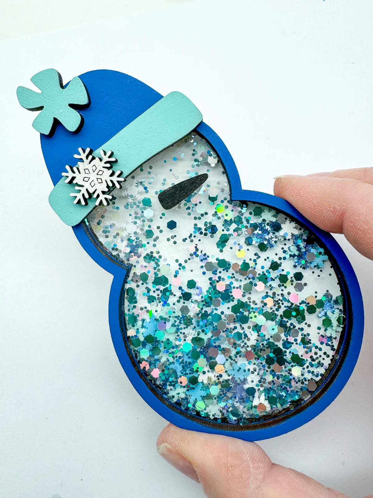 glitter filled snowman ornament