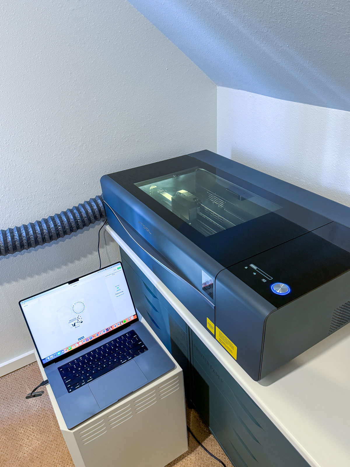 xTool P2 laser cutter set up in craft room