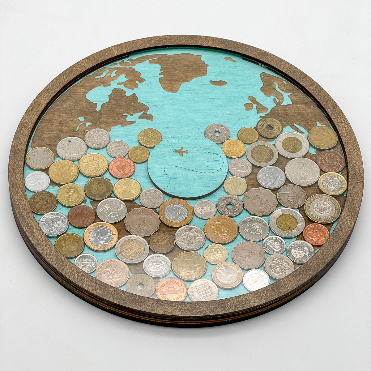 foreign currency displayed in a DIY coin holder