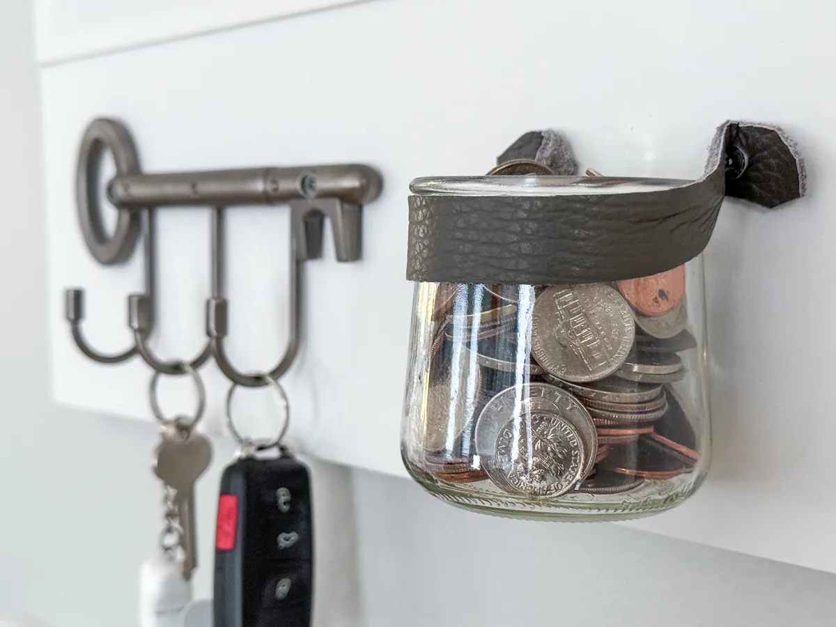 coin jar next to key rack