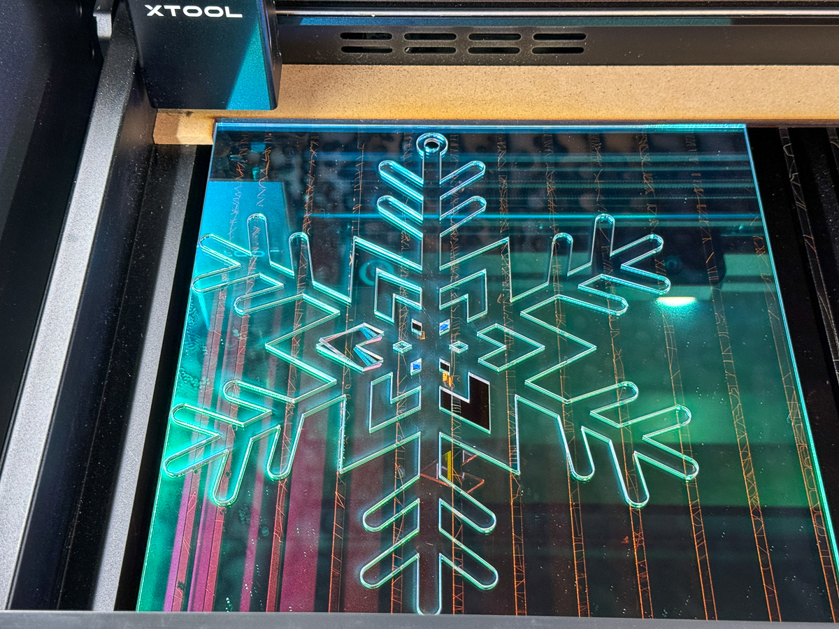 large acrylic snowflake in the xTool P2 laser cutter