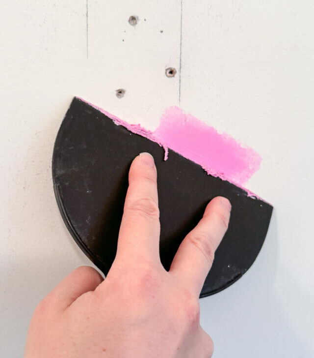 repairing anchor holes in drywall with spackle