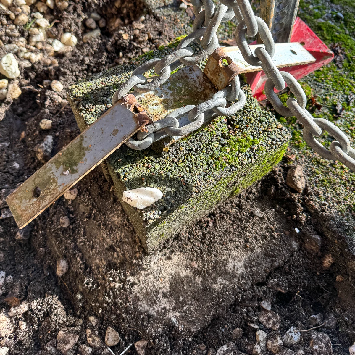 chain wrapped around concrete post